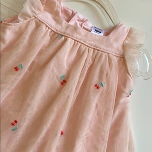 Carter’s pink dress with cherry design